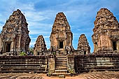 Angkor - Eastern Mebon - towers of the  central platform representing the peaks of Mount Meru